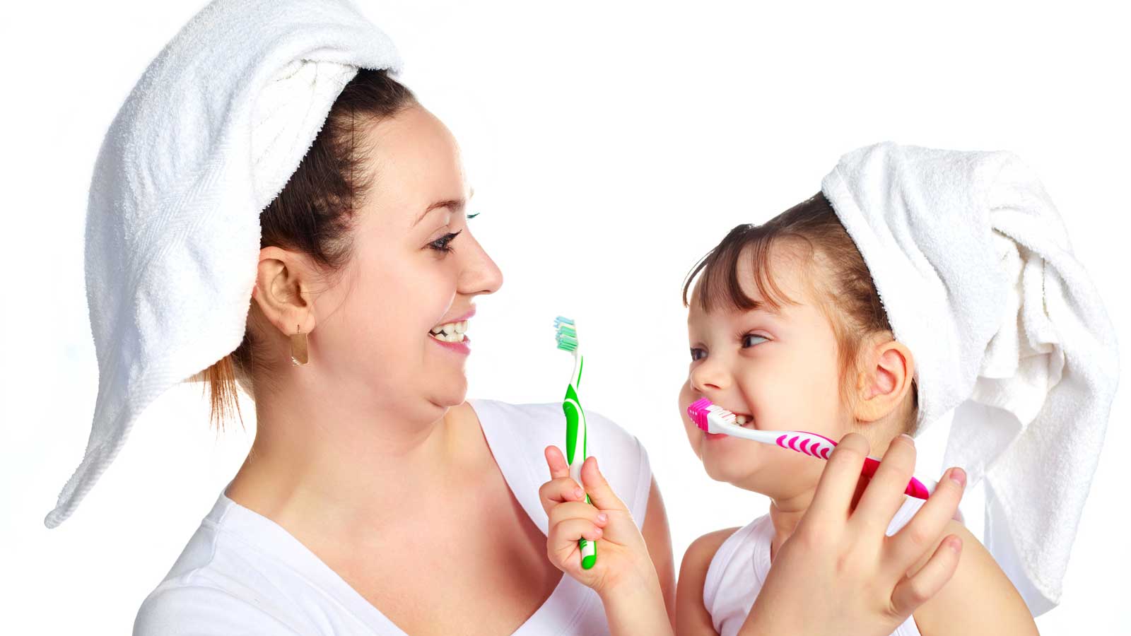 Mother and Daughter Brushing Teeth